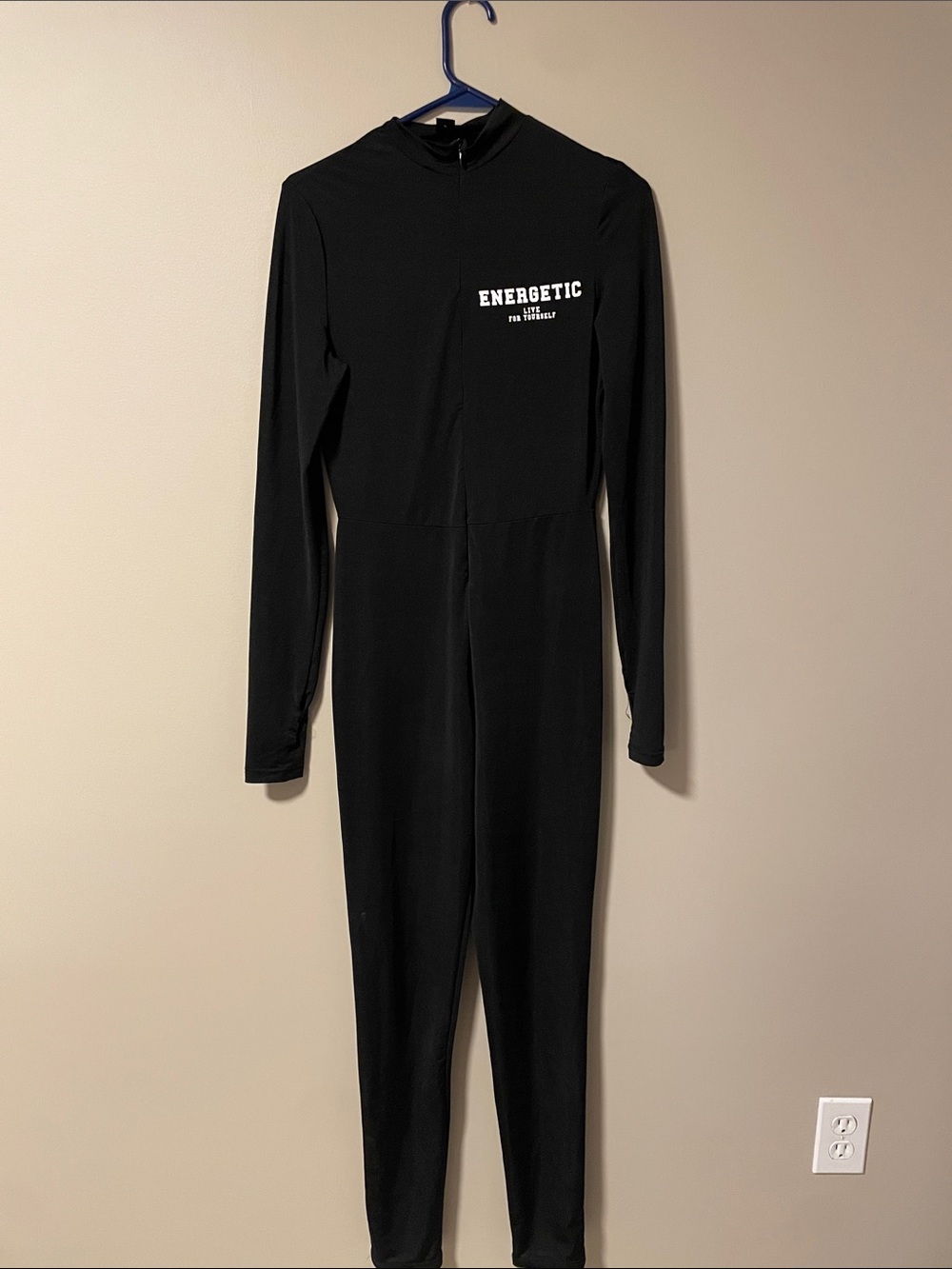 Energetic Black Zip-Front One-Piece bodysuit